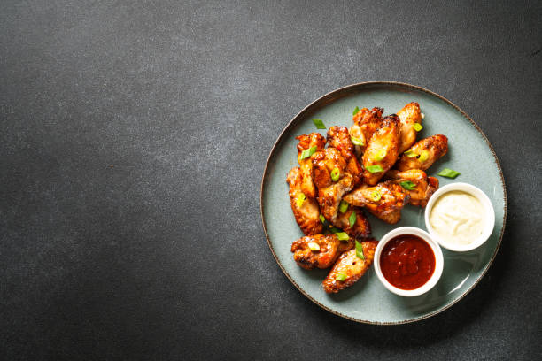 istock Chicken wings in bbq sauce grilled . 1927366993