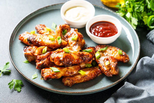 istock Chicken wings in bbq sauce grilled . 1927366996