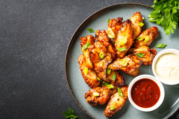 istock Chicken wings in bbq sauce grilled . 1927367005