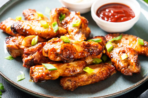 istock Chicken wings in bbq sauce grilled . 1927367007