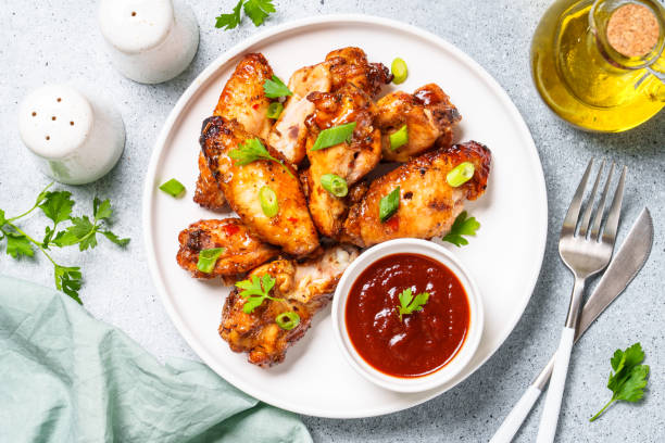istock Chicken wings in bbq sauce grilled . 1927367008