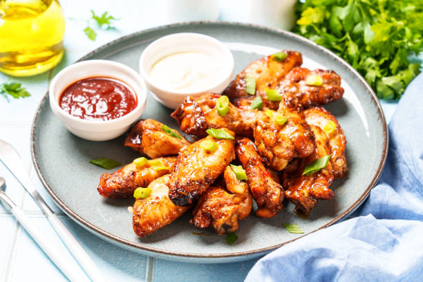 istock Chicken wings in bbq sauce grilled . 1927367009