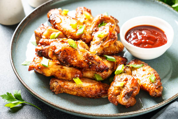 istock Chicken wings in bbq sauce grilled . 1927367011