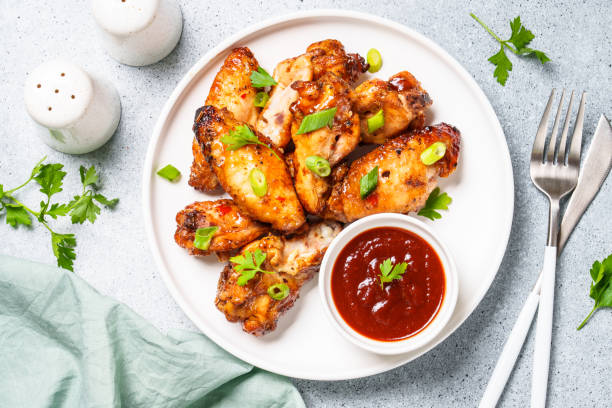 istock Chicken wings in bbq sauce grilled . 1927367035