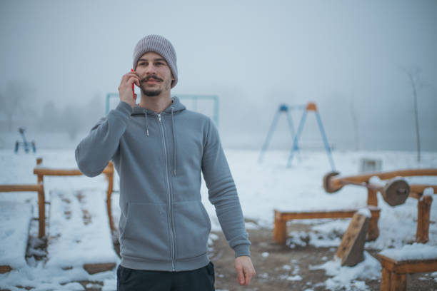 istock young man talking on the phone after training 1927380674
