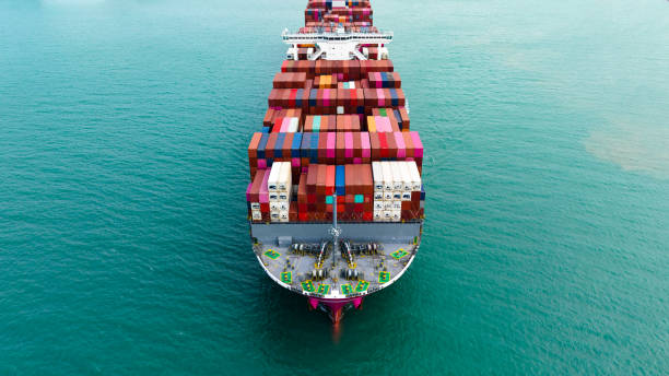 istock logistic cargo container ship sailing in sea to import export goods and distributing products to dealer and consumers across worldwide, aerial front view 1927416569