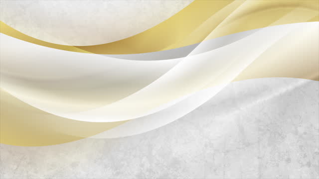 White and shiny golden waves on grey grunge texture abstract background
