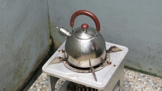 old kerosene stove and abandoned, flat lay