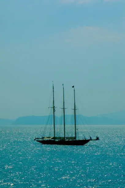 Photo of A sailing ship floating in the sea