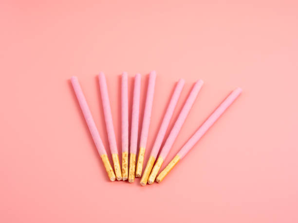 istock Crispy sticks in pink sugar glaze. 1927499023