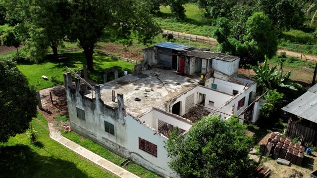 Aerial view over the ruins of an abandoned house