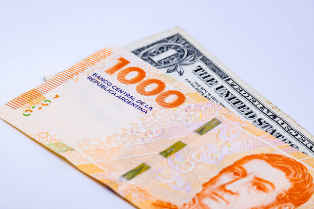istock One thousand Argentine pesos and one dollar 1927515158