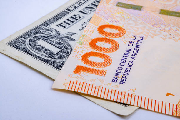 istock One thousand Argentine pesos and one dollar 1927515170