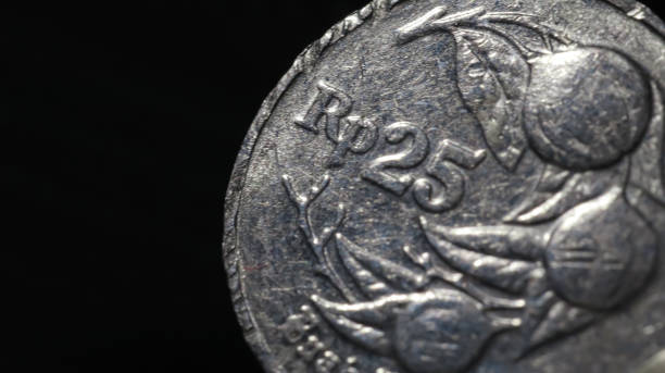 istock close-up of an old 25 silver rupiah coin 1927519503