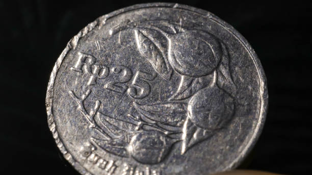 istock close-up of an old 25 silver rupiah coin 1927519701