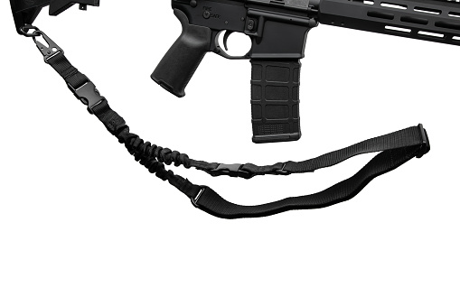 Black nylon shoulder strap for a gun isolated on white background