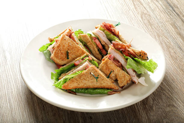 istock Bacon lettuce tomato and turkey sandwich on plate 1927581999
