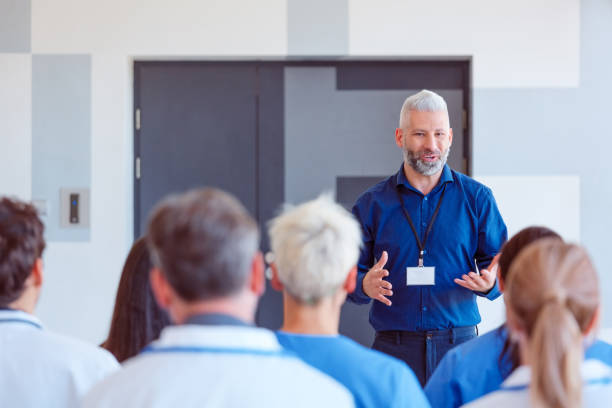 istock Man giving a speech on seminar for medical staff 1927588456