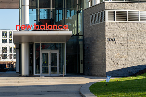 The entrance to New Balance (NB) headquarters in Boston, MA, USA, on November 11, 2023. New Balance Athletics, Inc. (New Balance), is an American sports footwear and apparel manufacturer.