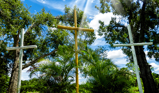 Close up wooden religious cross in nature