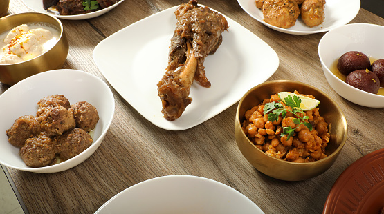 Group of traditional food dishes on table