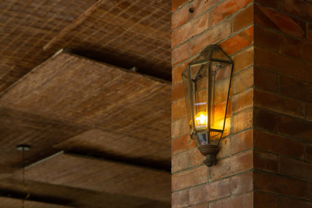 retro vintage lamp hanging on brick wall