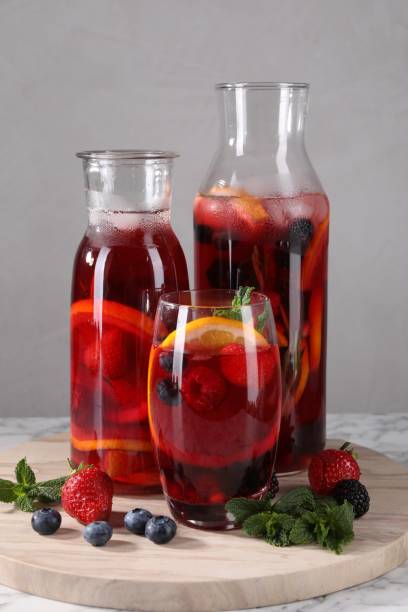 istock Delicious refreshing sangria and berries on table 1927634768