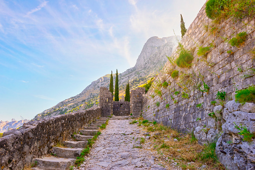 Staircase in ancient Kotor fortress at sunrise, Montenegro