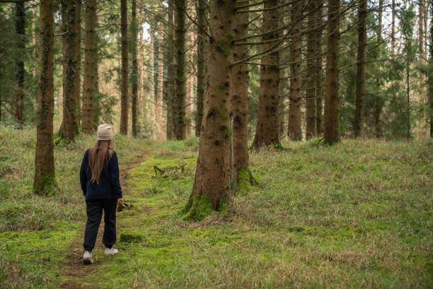 istock Woman in the forest 1927657465