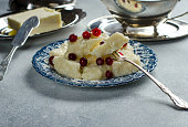 A dish of Ukrainian cuisine, lazy dumplings on a plate on the table, healthy breakfast, red berries, hot dish, cooking