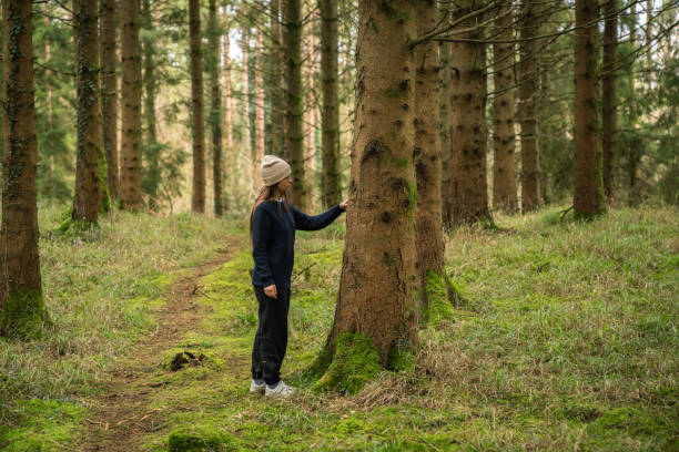 istock Woman in the forest 1927671405
