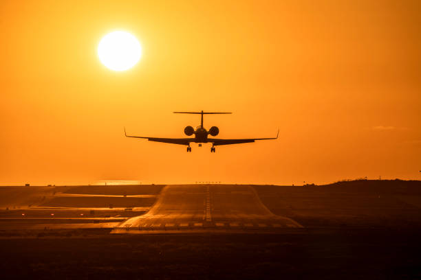 istock Small airplane taking off at sunset 1927675664
