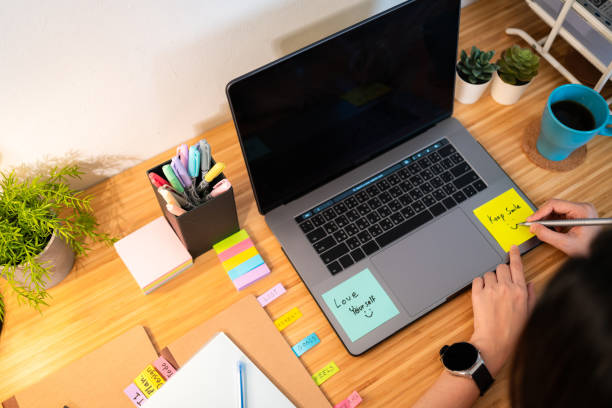 istock Woman working Video conference on laptop computer, hybrid work at home. 1927679918