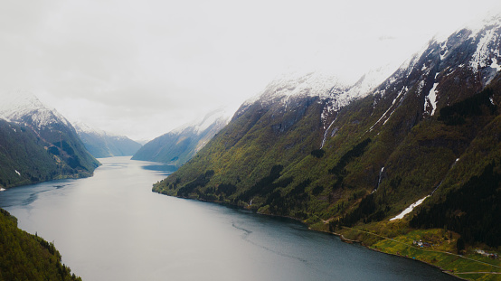 High-angle drone panoramic photo of the biggest fjord in Norway surrounded by beautiful mountain peaks in Scandinavia