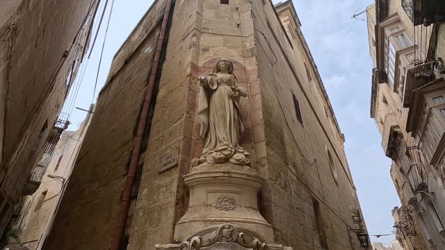 The Corner Statue Of Our Lady Of Sorrows In Cospicua In Malta