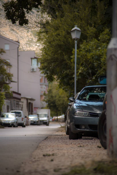 istock Parked cars on street 1927713901