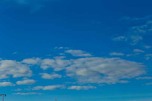 Shot of white clouds on blue sky.