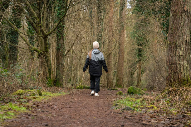 istock Woman in the forest 1927759885
