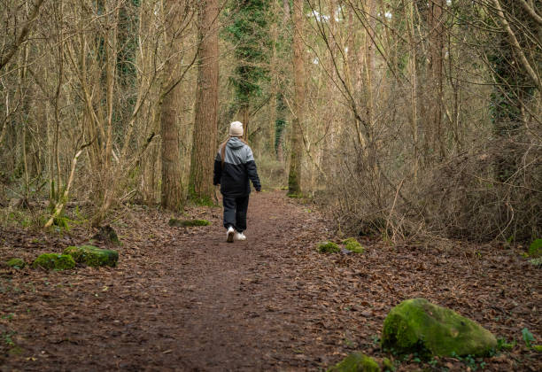 istock Woman in the forest 1927763008