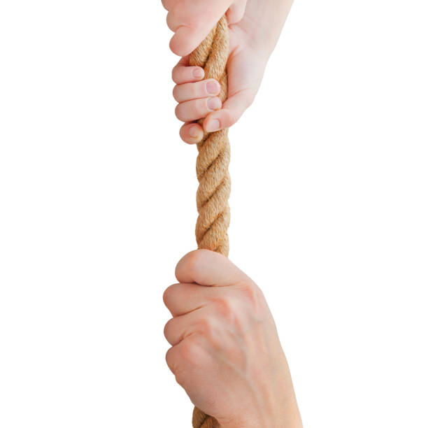 istock A child saves his father with a rope. 1927785922
