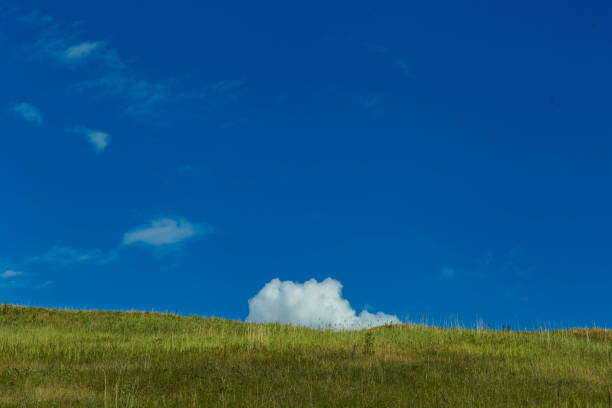 istock The mountainside and the sky with clouds 1927808494