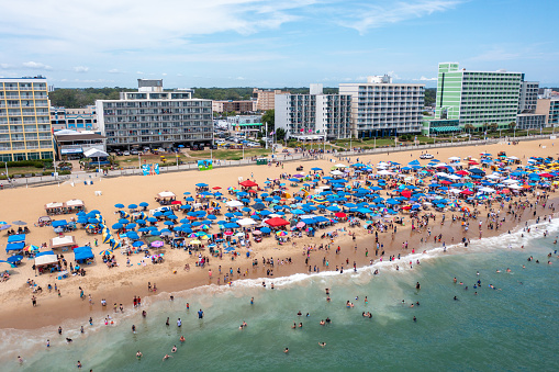 Virginia Beach Virginia - July 3 2023: Aerial View of the Virginia Beach Oceanfront With Crowds and Hotels Seen from the Atlantic Ocean