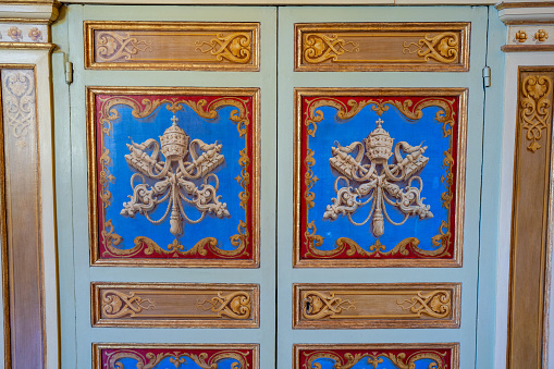 Vatican City Vatican - October 3 2023: The Papal Symbol for the Vatican Painted as a Mural on Panels in the Vatican Museum