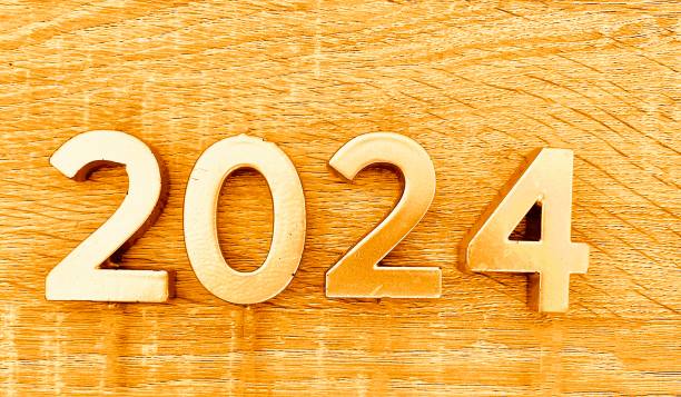 istock “2024” Candle Numbers on Wood Table 1927827976