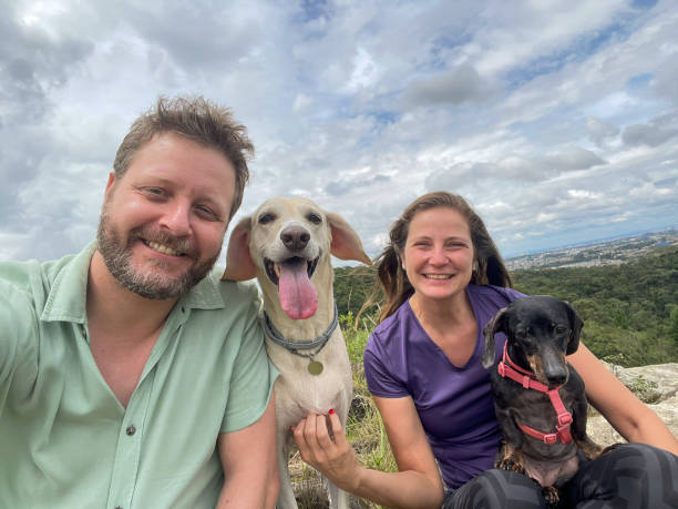 istock Family taking a selfie with pets on a mountain 1927882284