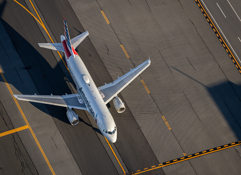 Boston, United States – August 31, 2022: An aerial shot of American Airlines Airbus 319 taxiing at Boston's Logan International Airport