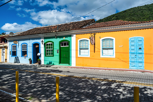 Ribeirao, Brazil - Dec 23, 2023: Old colorful houses in colonial Portuguese architecture in Ribeirao da Ilha, Florianopolis, Santa Catarina, Brazil.