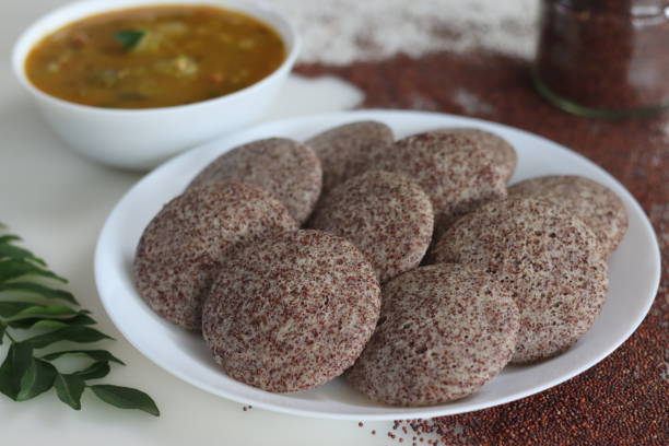 istock Ragi Idli served with sambhar. A nutritious South Indian staple made with fermented batter of unpolished finger millet and deskinned black gram 1927928043