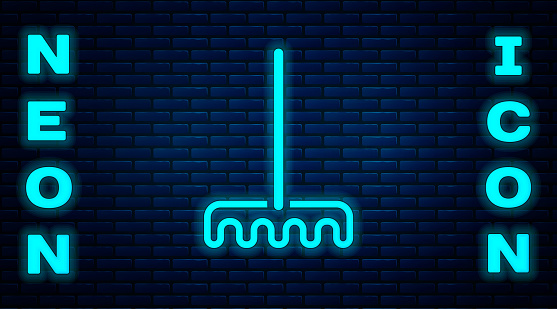 Glowing neon Garden rake icon isolated on brick wall background. Tool for horticulture, agriculture, farming. Ground cultivator. Housekeeping equipment. Vector.