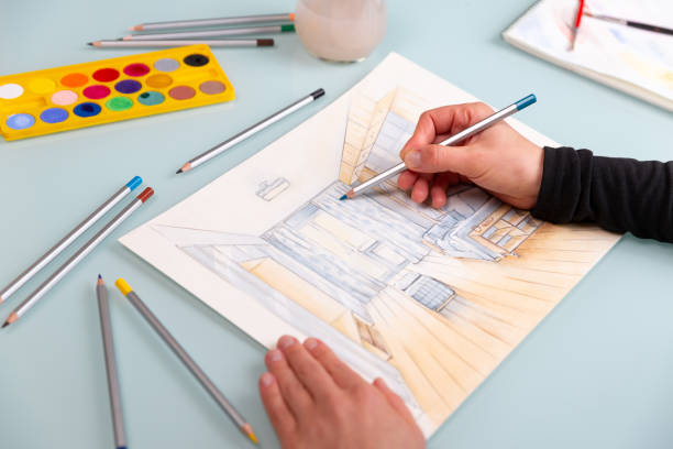 istock Interior designer is working on color hand drawing of comfortable guest room using a pencil. 1928013667